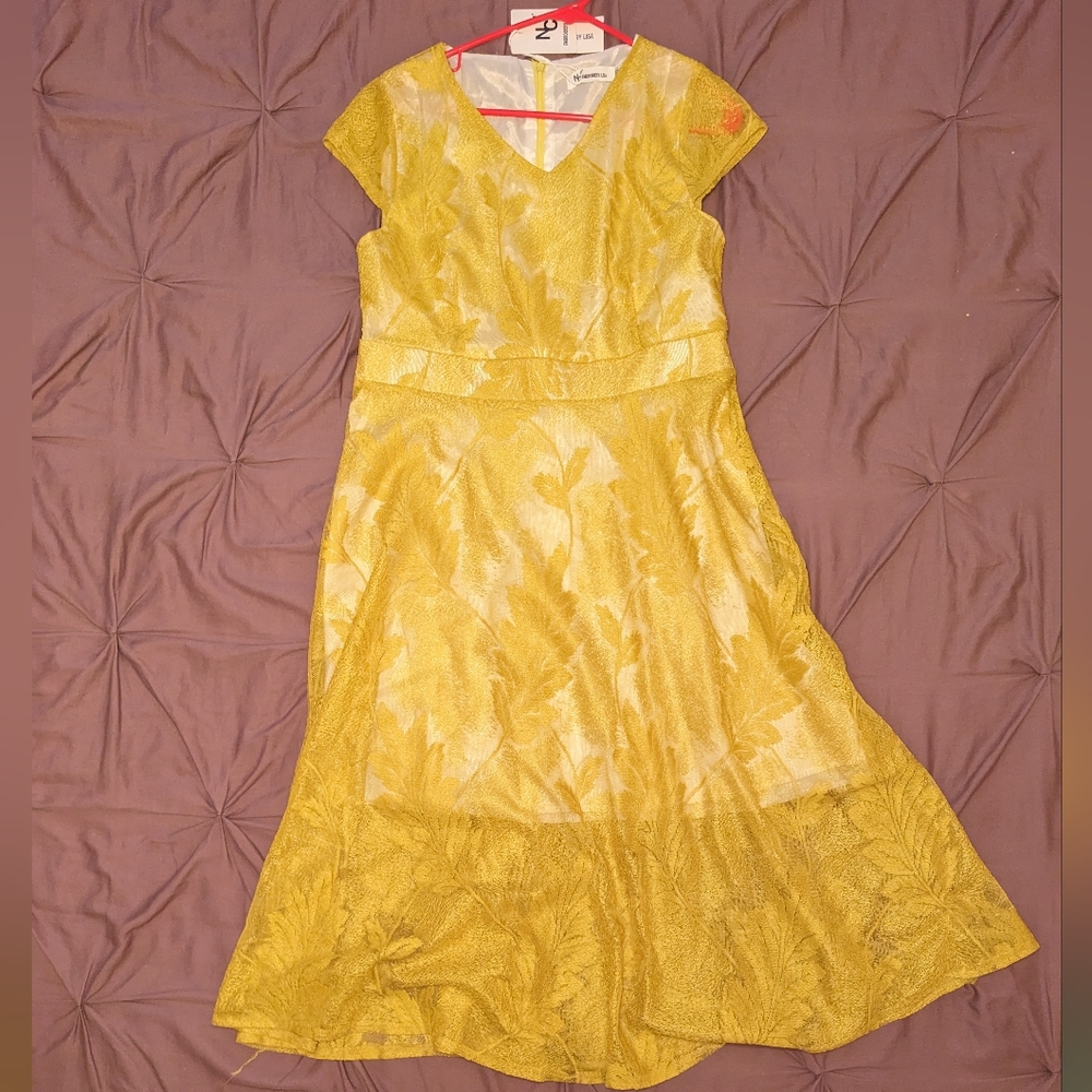 Yellow sheer Fern pattern over white dress